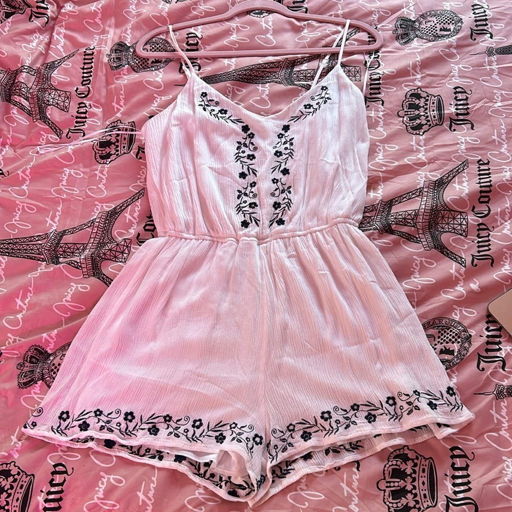 Francesca’s white floral romper